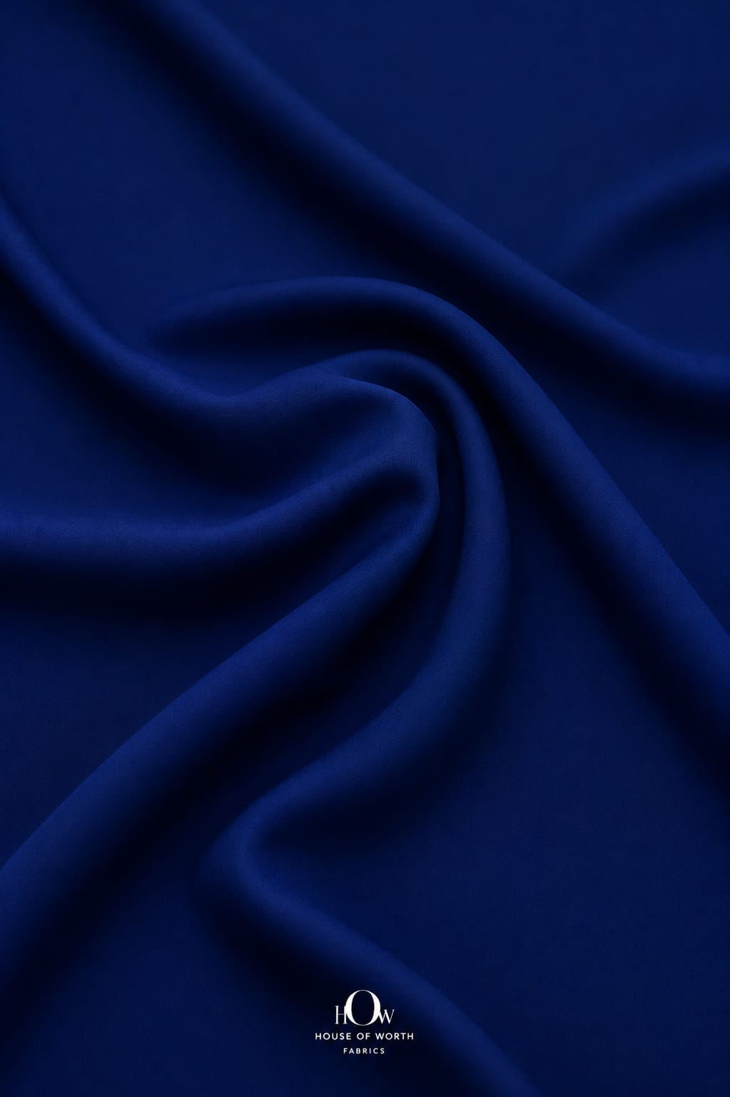 Navy blue 4 way Lycra fabric showing stretch for active and fitted garments. 