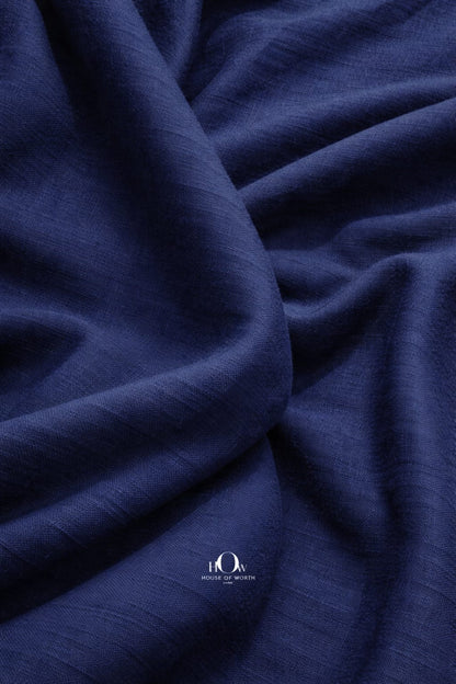 Premium cotton linen blend fabric navy blue texture close up for garment manufacturers