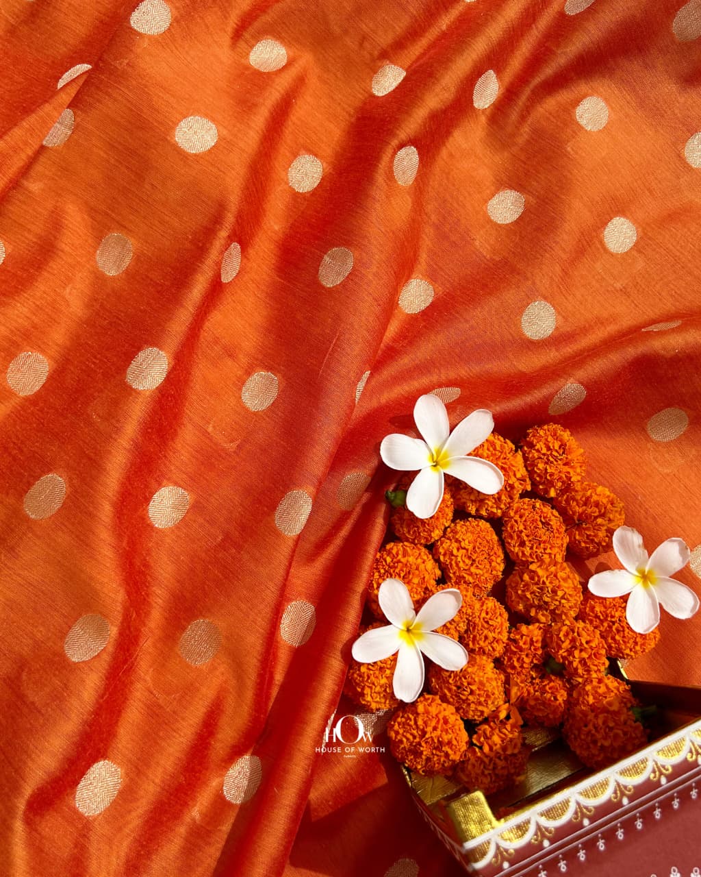 Premium orange chanderi fabric with elegant dot motifs