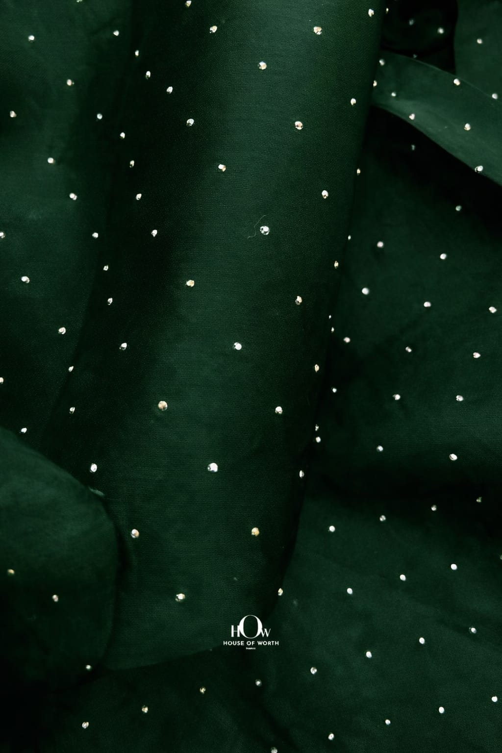 Dark bottle green organza fabric embellished with sparkling rhinestones, luxurious and sheer