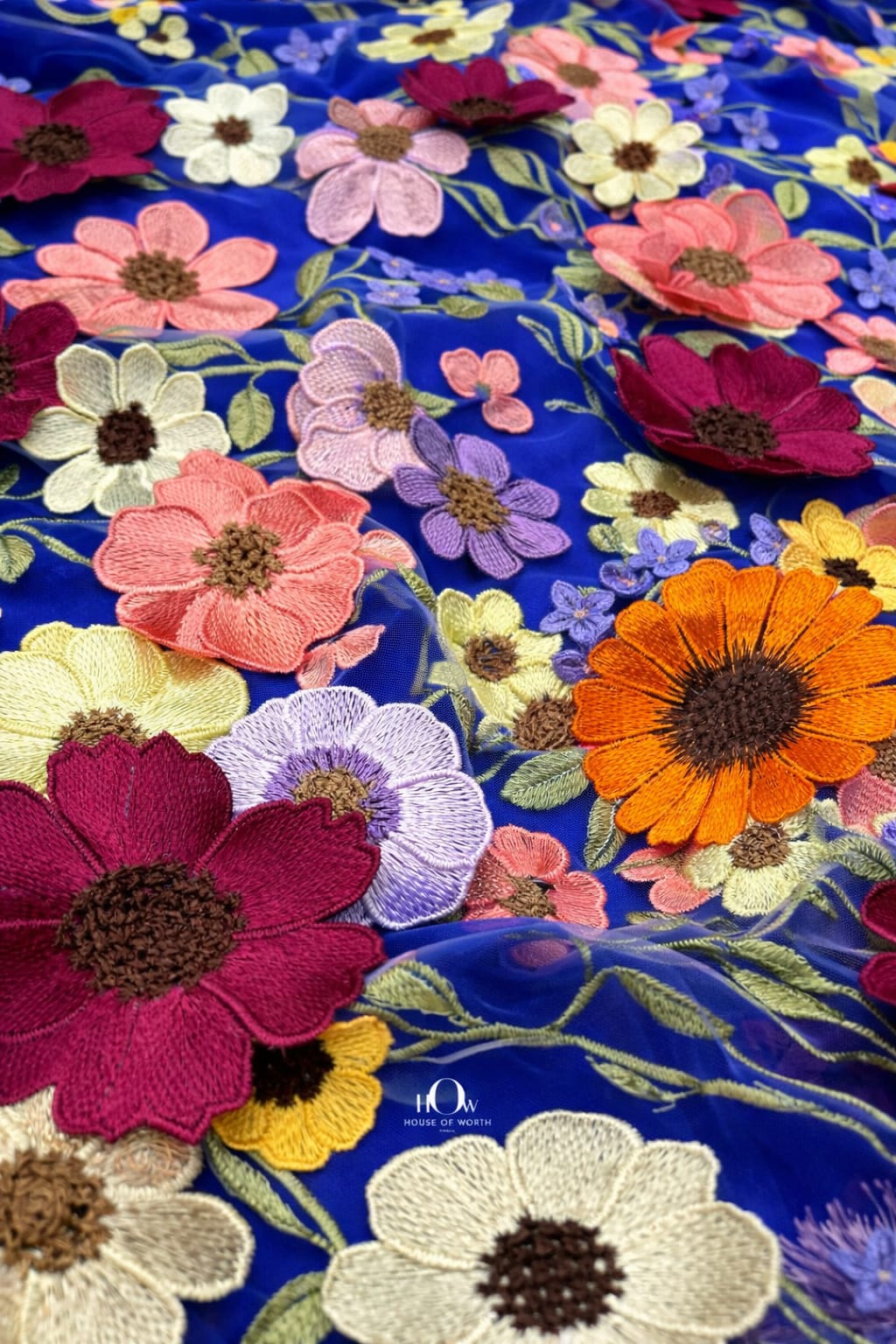 Royal blue floral applique fabric drape for designer wear, red carpet fabric mood on net