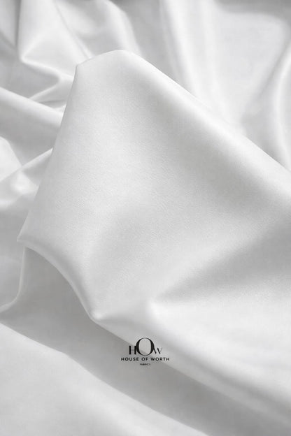  Premium white leather fabric on cutting table—easy to stitch for tailoring and studios