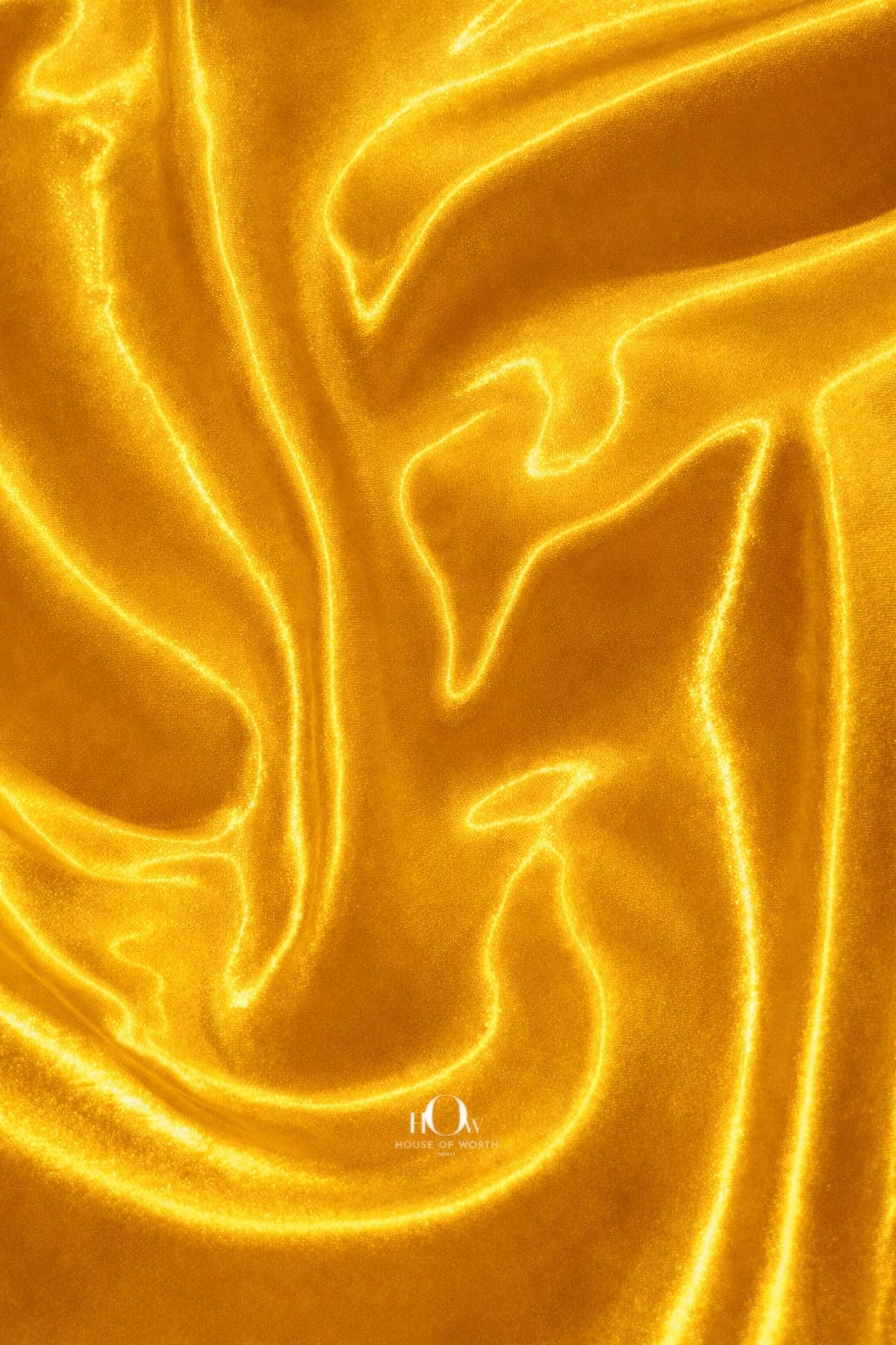 Heavy satin fabric in yellow shade with smooth texture and rich sheen