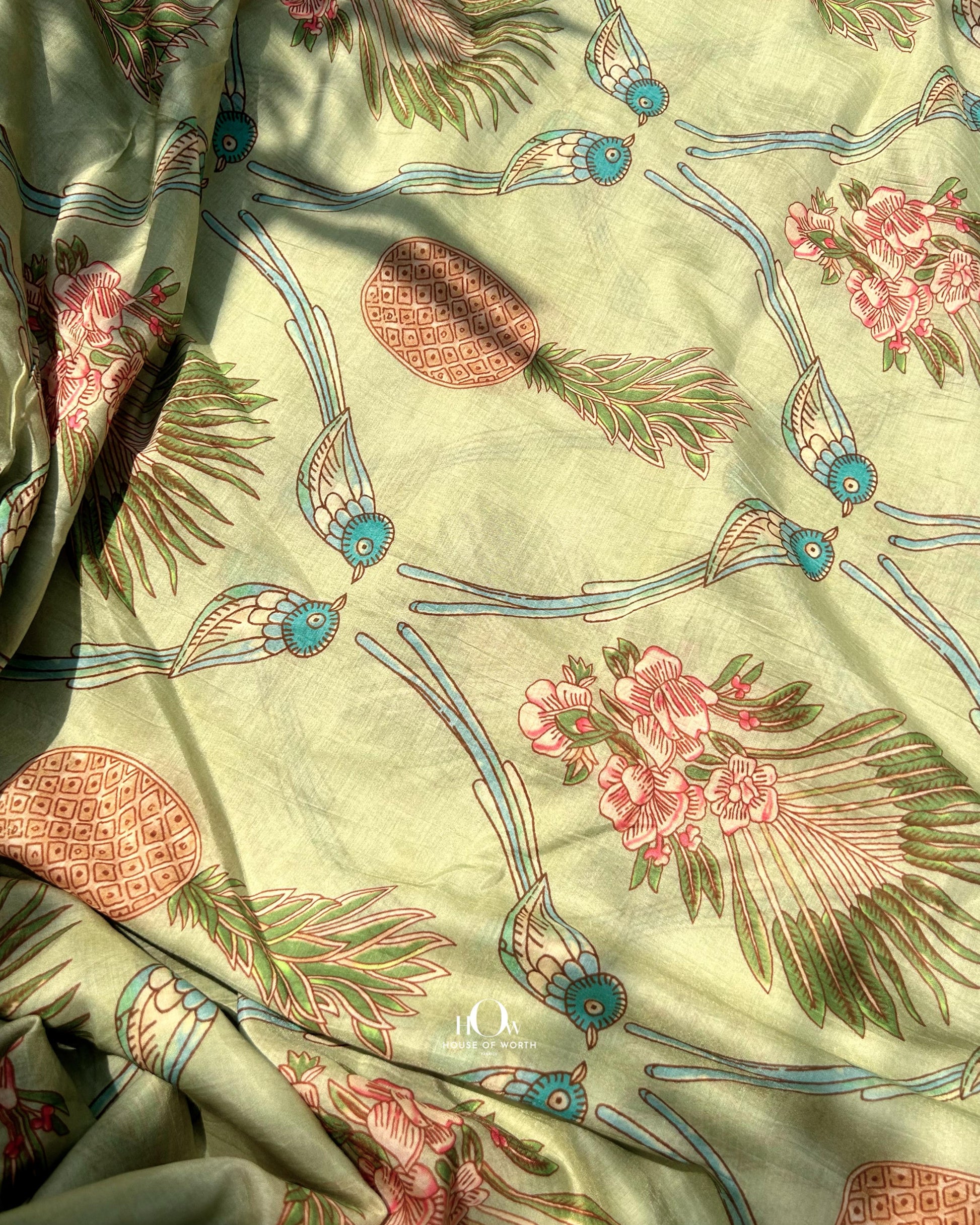 Printed Mul Chanderi fabric in pastel green with tropical leaf design – perfect for salwar suits and ethnic wear.