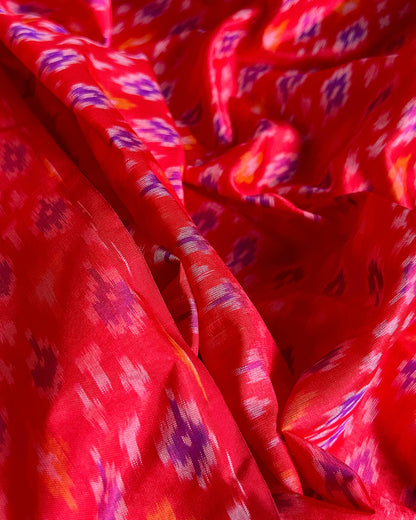 Vibrant pure silk ikat fabric – ideal for sarees and gowns. Ikat silk suppliers in mumbai