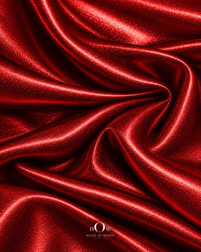 Close view of red metallic Disco Lycra fabric for partywear and costume design