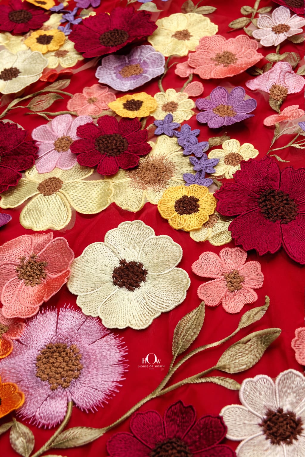3d flower fabric in red net with dimensional petals, statement fabric for dresses and evening wear