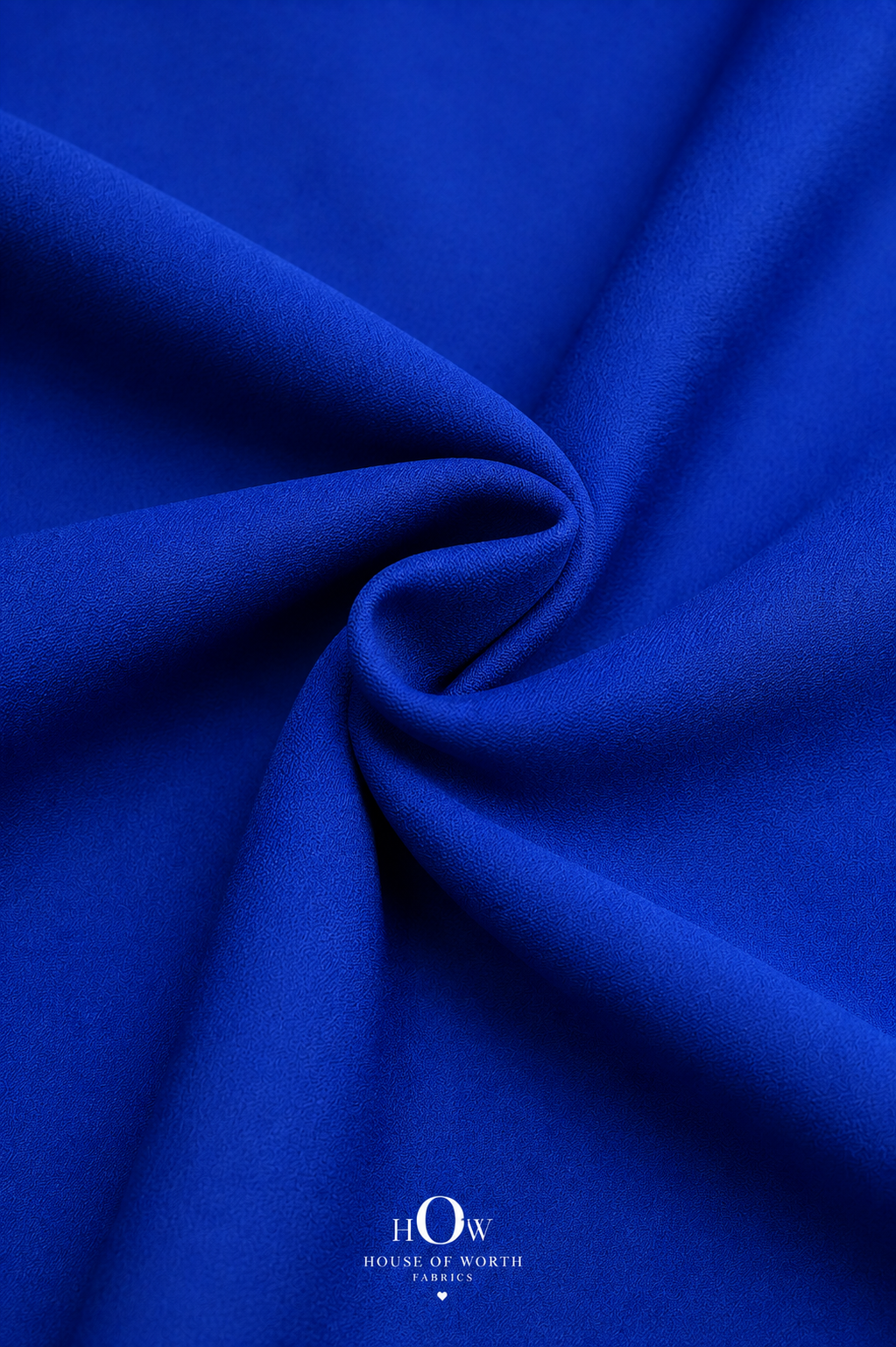 Close-up of navy blue Scuba Sandwich Fabric showing its smooth-looking surface and neat solid finish