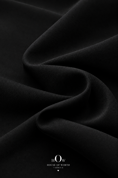 Solid black Imported Scuba Sandwich Fabric with a clean, smooth-looking surface and structured appearance