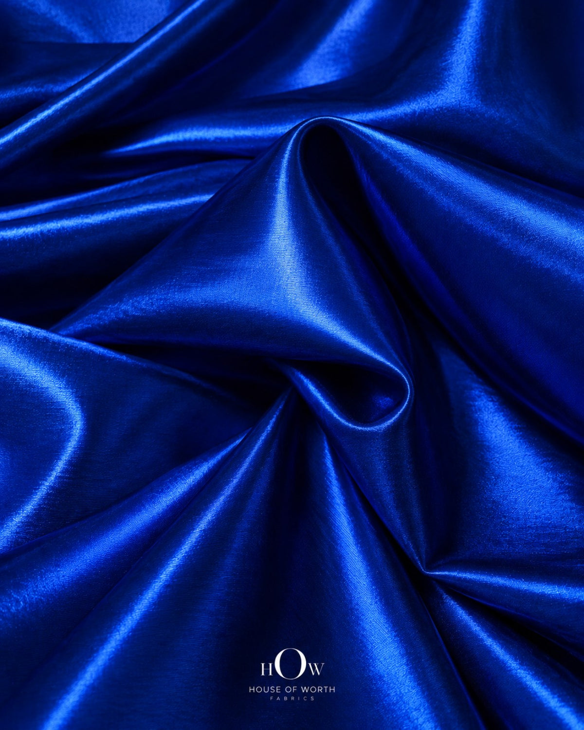 Royal blue shiny metallic Lycra fabric drape for dresses, stagewear and statement fashion