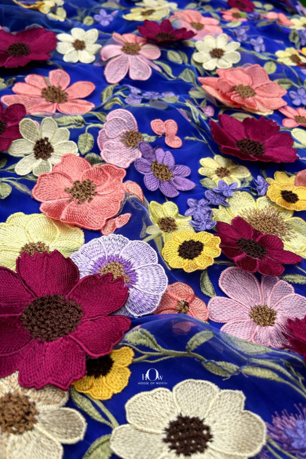3d flower fabric on royal blue mesh, floral embroidery depth for gowns, dresses and boutique edits