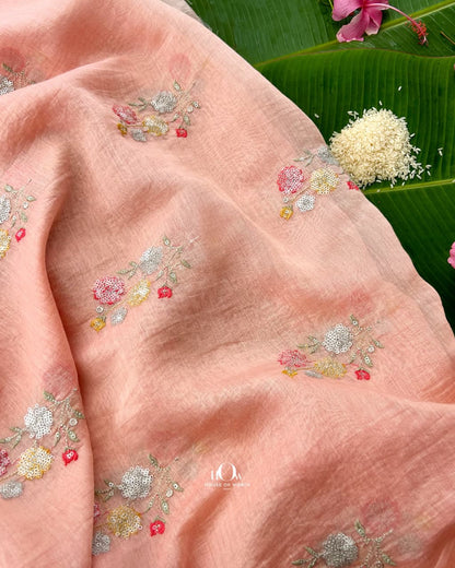 Salmon pink Pure Mul Chanderi fabric with scattered floral thread and sequin embroidery