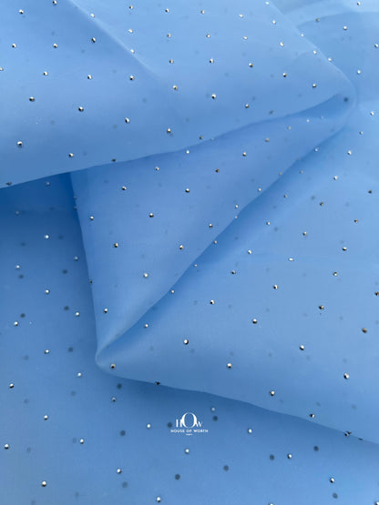 Imported shimmer organza net fabric for partywear in Bhiwandi, elegant designs.