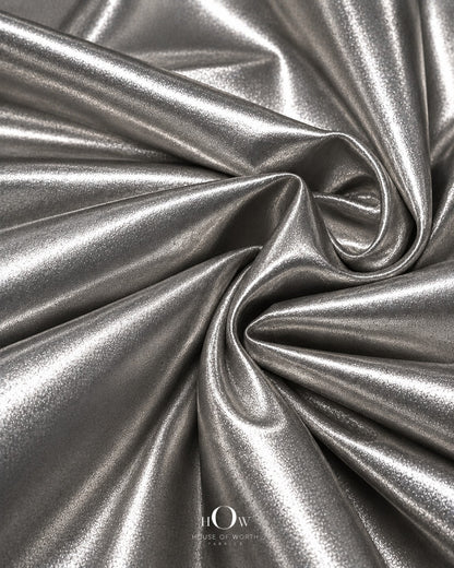 Close view of silver metallic Disco Lycra fabric for partywear, stagewear and costumes