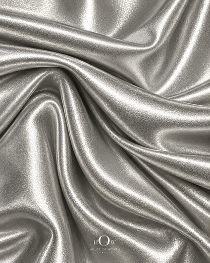 Silver polyester-spandex metallic Disco Lycra fabric texture, 60 inches wide