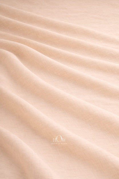 Beige cotton poplin fabric with structured drape for garments