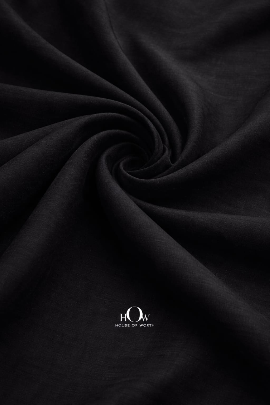 Black cotton poplin fabric with smooth drape and structured weave