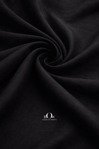 Black cotton poplin fabric with smooth drape and structured weave