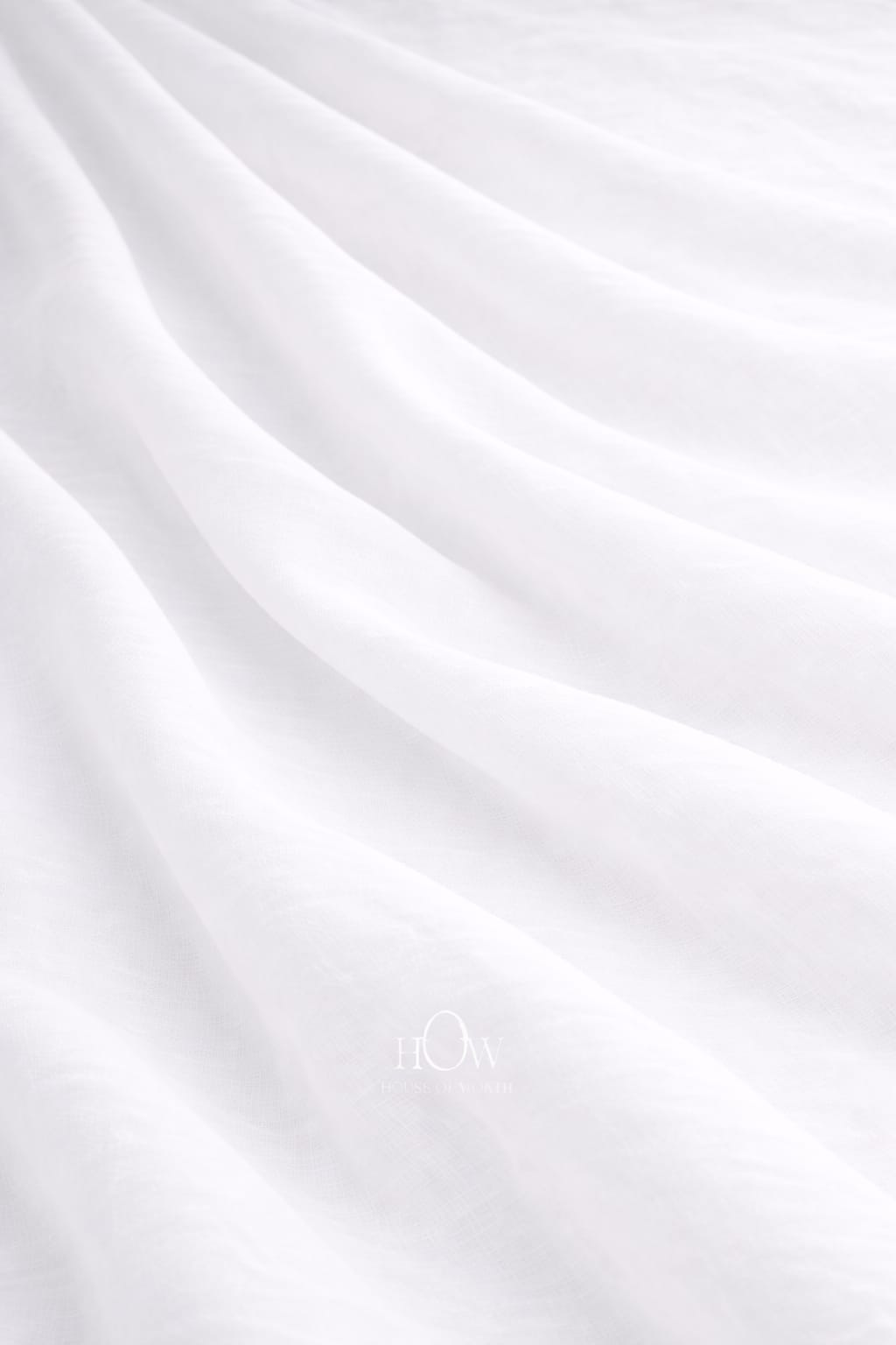 White cotton poplin fabric with crisp smooth drape
