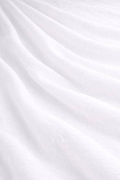White cotton poplin fabric with crisp smooth drape