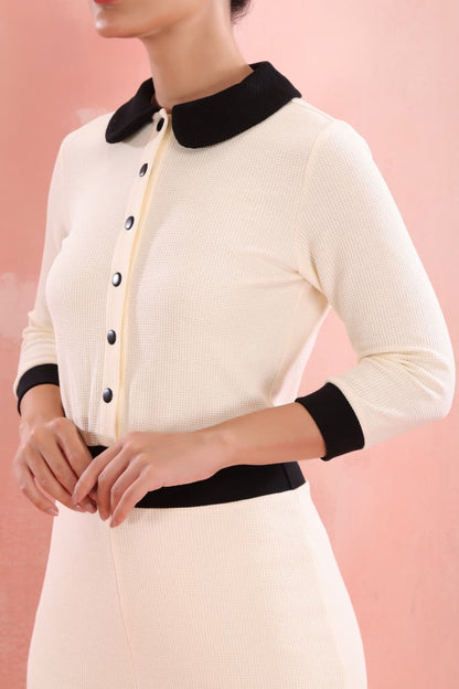 Trendy women’s long sleeve cream jumpsuit with black trim perfect everyday wear