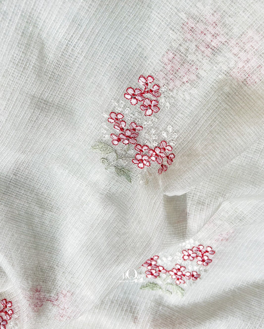 Vrinda Kota Doria Red floral embroidery fabric close-up