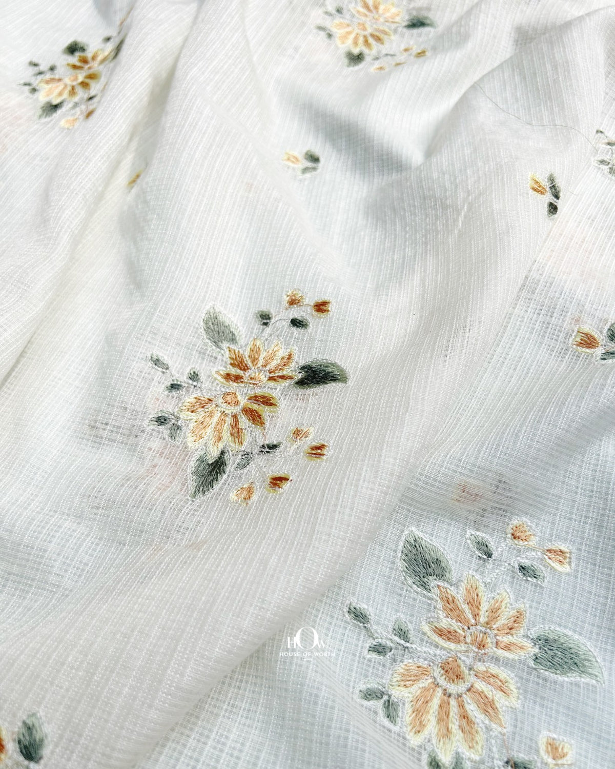 Vrinda Kota Doria Yellow floral embroidered fabric motif detail