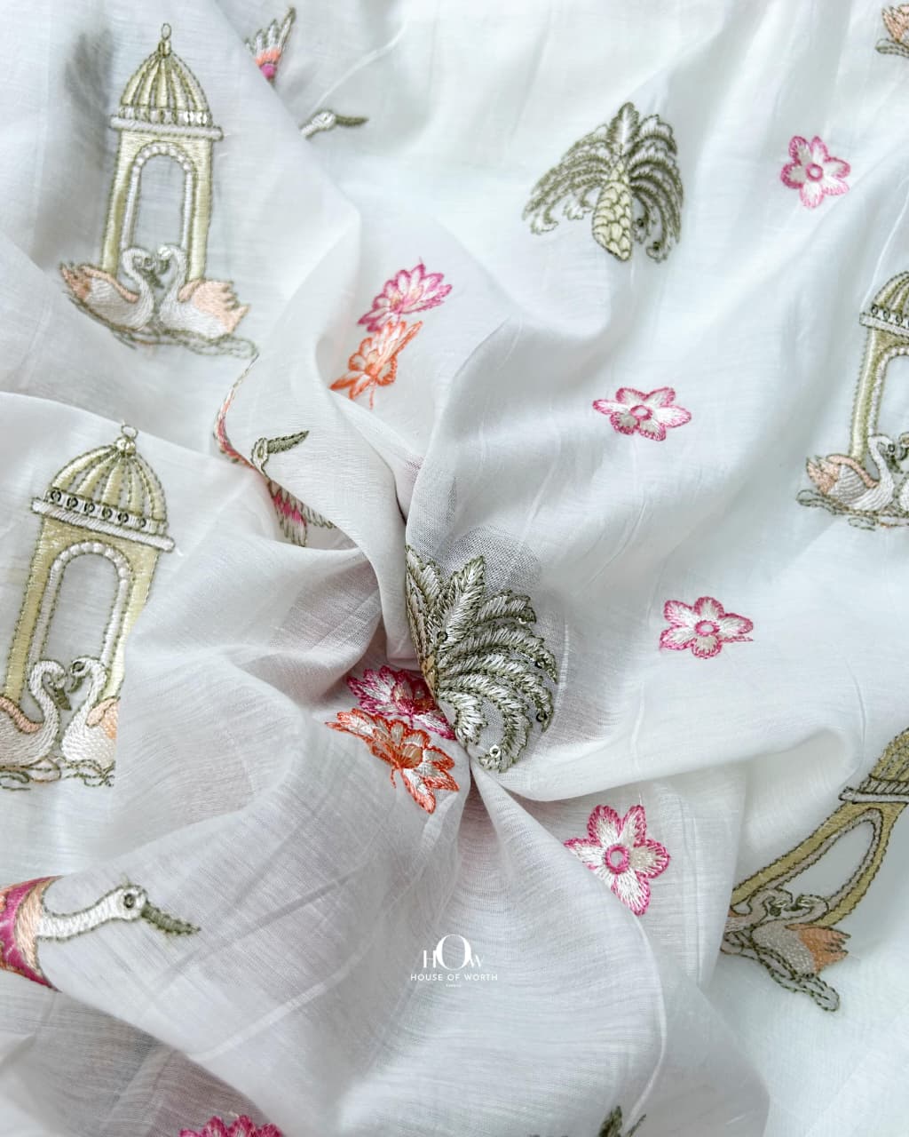 white chanderi fabric with fine embroidery for elegant wear