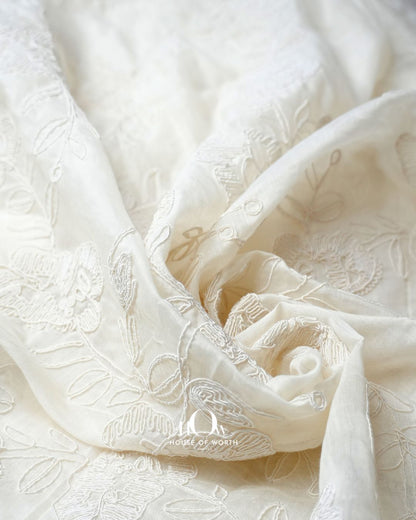 Premium Ivory White Chanderi fabric featuring all over floral embroidery design