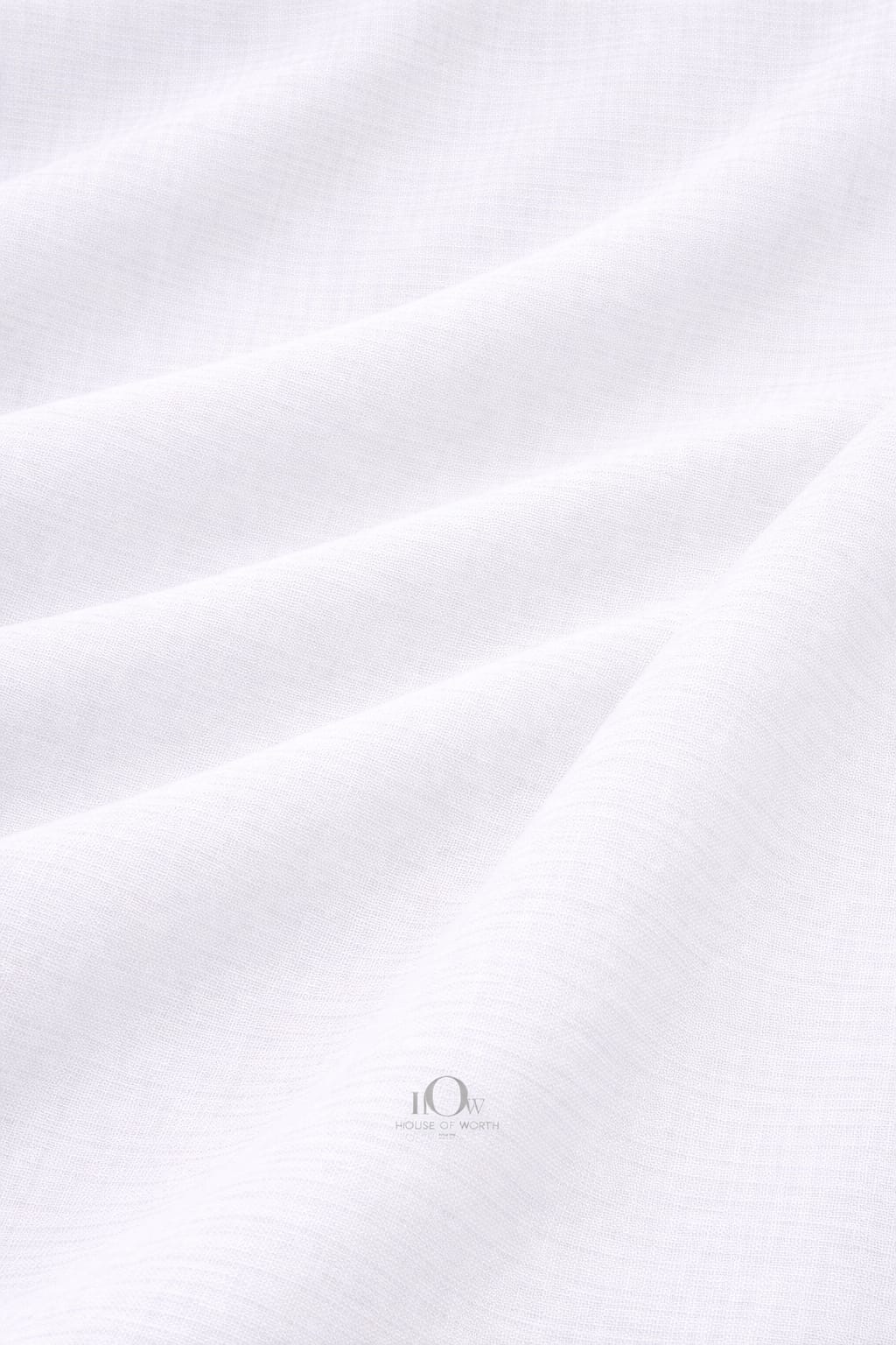 White cotton linen fabric with natural texture for summer shirts and resort tailoring