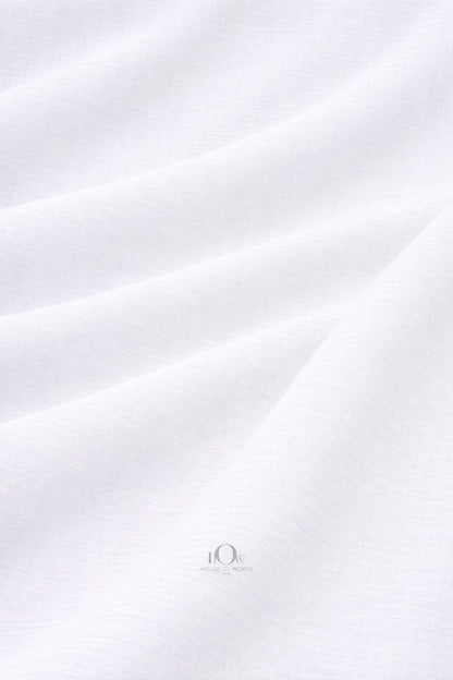 White cotton linen fabric with natural texture for summer shirts and resort tailoring