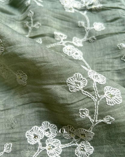 Mul Chanderi fabric supplier India – pastel green embroidered fabric ideal for boutiques and festive ethnic wear.