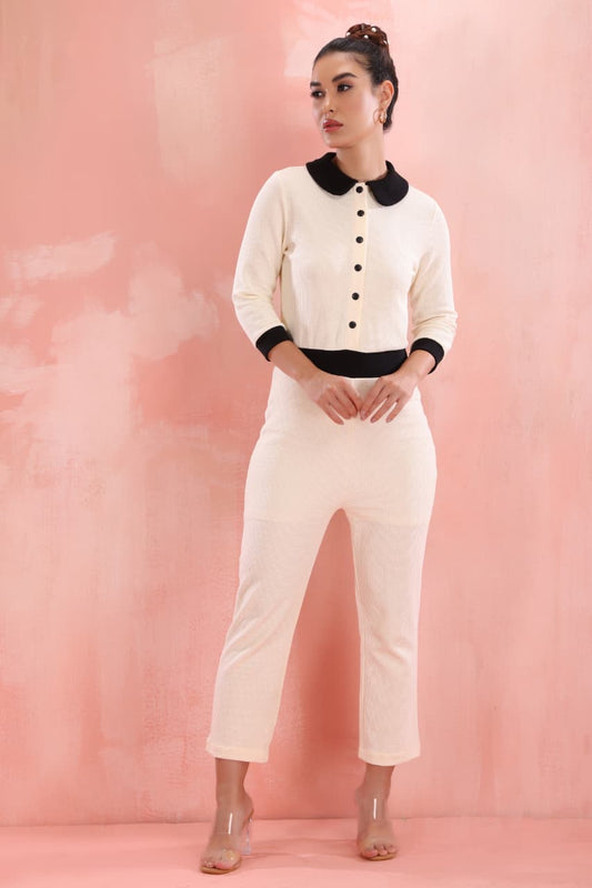 Women’s cream jumpsuit with black collar and button front stylish trendy fashion
