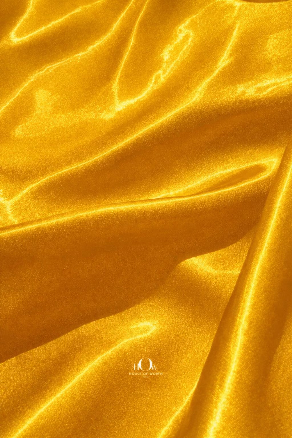 Premium yellow glass satin fabric ideal for gowns, sarees and party wear