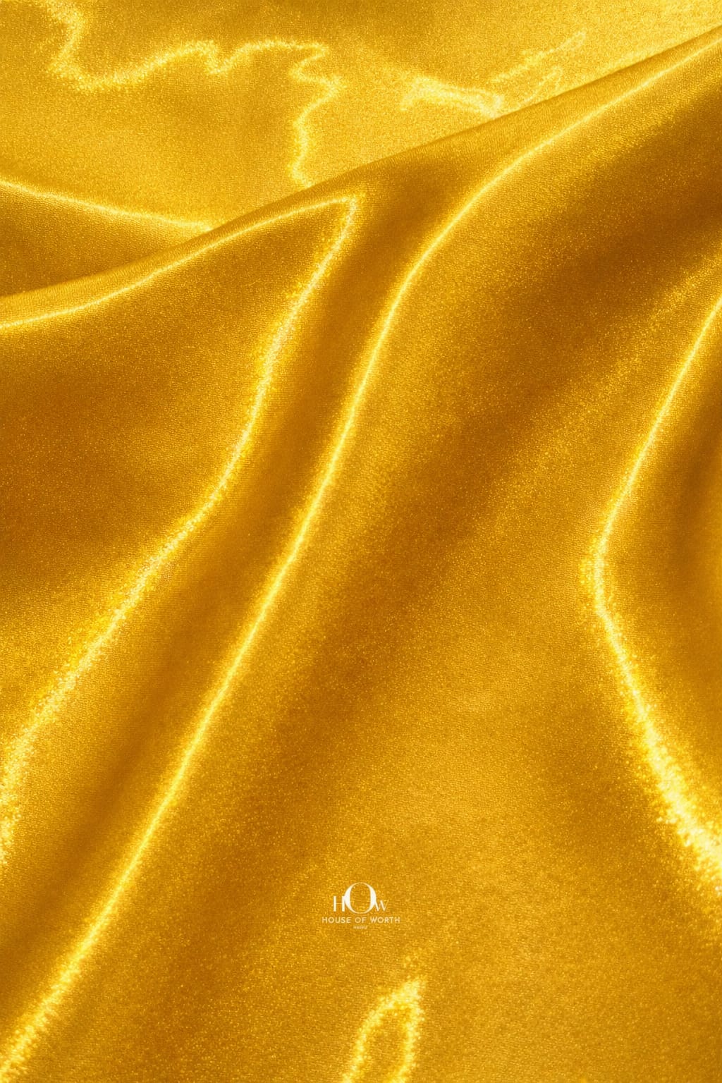 Yellow imported liquid satin fabric with high gloss finish and fluid drape