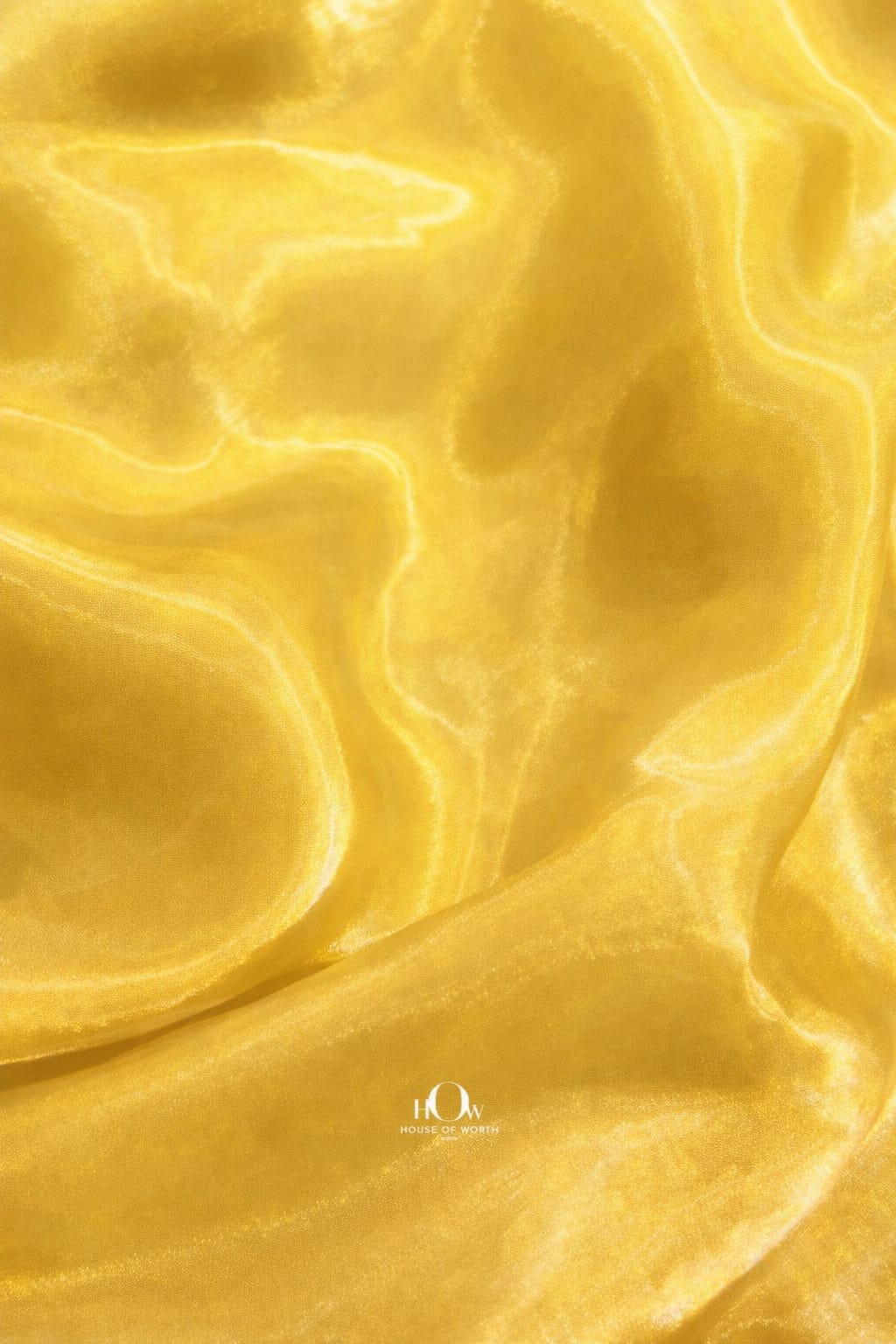 Premium yellow glass organza fabric for sarees, gowns, and western outfits