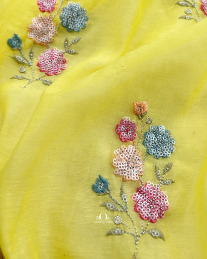 Yellow Pure Mul Chanderi fabric with scattered floral thread and sequin embroidery
